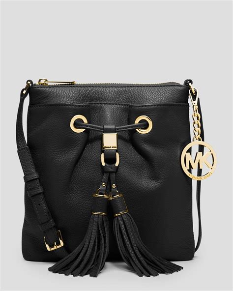 michael kors black crossbody brass tassel|Michael Kors black crossbody.